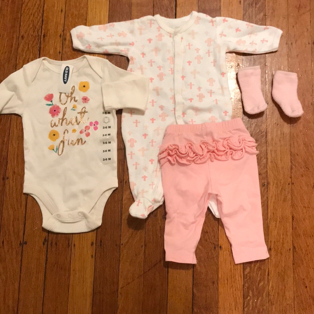 Baby size 0 sleeper pants and Sox and new tee